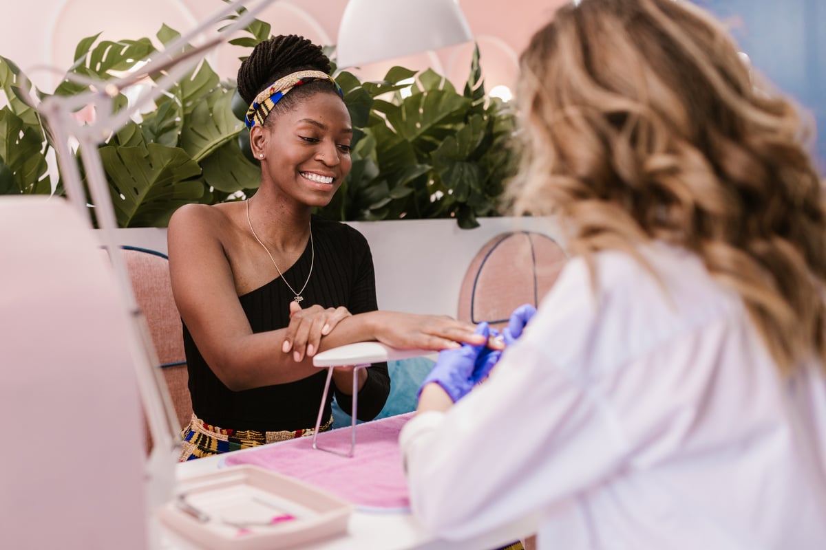 A Woman Getting Manicure