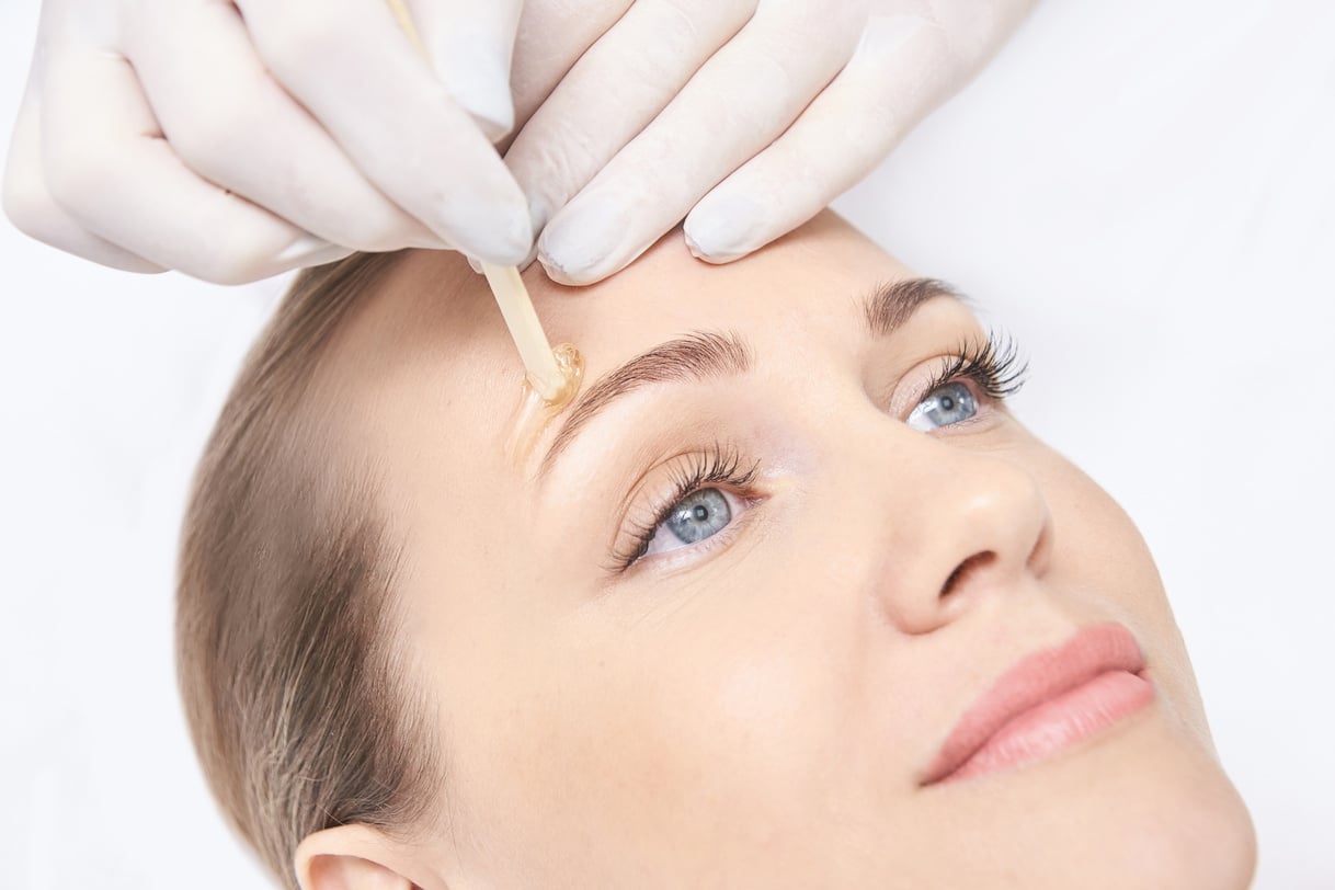 Woman Getting Her Eyebrows Waxed    